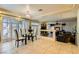 Breakfast nook with glass table and chairs near kitchen at 6250 Pale Pavilion Ave, Las Vegas, NV 89139
