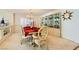 Elegant dining room with a formal table and display cabinets at 6250 Pale Pavilion Ave, Las Vegas, NV 89139