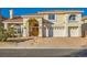Two-story house with a brick driveway and a three-car garage at 6250 Pale Pavilion Ave, Las Vegas, NV 89139