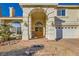 Elegant double front doors with a brick pathway and columns at 6250 Pale Pavilion Ave, Las Vegas, NV 89139