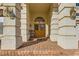 Elegant double front doors with a brick pathway and columns at 6250 Pale Pavilion Ave, Las Vegas, NV 89139