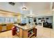 Kitchen boasts granite countertops and ample cabinetry at 6250 Pale Pavilion Ave, Las Vegas, NV 89139