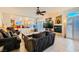 Spacious living room featuring comfortable seating and a fireplace at 6250 Pale Pavilion Ave, Las Vegas, NV 89139