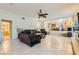 Open living space with a view into the kitchen and a bathroom at 6250 Pale Pavilion Ave, Las Vegas, NV 89139