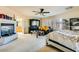Main bedroom with a cozy sitting area and fireplace at 6250 Pale Pavilion Ave, Las Vegas, NV 89139