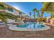 Inviting kidney-shaped pool with a spa and a covered patio at 6250 Pale Pavilion Ave, Las Vegas, NV 89139