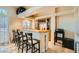 Wet bar with seating and wine storage at 6250 Pale Pavilion Ave, Las Vegas, NV 89139