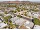 Aerial view of a home and neighborhood, highlighting its location and surrounding landscape at 635 8Th St, Boulder City, NV 89005