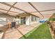Backyard patio with pergola, hot tub, and seating area at 635 8Th St, Boulder City, NV 89005