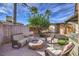 Backyard oasis with fire pit, hot tub, and seating at 635 8Th St, Boulder City, NV 89005