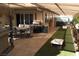 Large backyard with patio, grill, and cornhole game at 635 8Th St, Boulder City, NV 89005