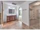 Bathroom with a walk-in closet and double vanity at 635 8Th St, Boulder City, NV 89005