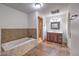 Relaxing bathroom with soaking tub and double vanity at 635 8Th St, Boulder City, NV 89005