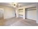 Bedroom with built-in shelving and access to another room at 635 8Th St, Boulder City, NV 89005
