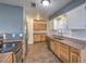 Kitchen with wood cabinets, stainless steel appliances, and tile floor at 635 8Th St, Boulder City, NV 89005