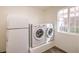 Laundry room with washer, dryer, and refrigerator at 635 8Th St, Boulder City, NV 89005