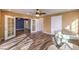Living room with wood-look floors and access to other rooms at 635 8Th St, Boulder City, NV 89005