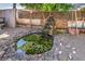 Charming water feature with stonework and lush foliage at 635 8Th St, Boulder City, NV 89005