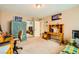 Bright bedroom featuring a built-in desk and an armoire at 6917 Snow Finch St, North Las Vegas, NV 89084