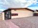 Exterior view of a building with a walkway and gated entrance at 720 N 10Th St, Las Vegas, NV 89101