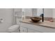 Clean bathroom with updated vanity and vessel sink at 7220 Stormson Dr, Las Vegas, NV 89145