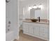 Clean bathroom with updated vanity and vessel sink at 7220 Stormson Dr, Las Vegas, NV 89145