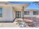 House exterior with double doors and a covered entryway at 7220 Stormson Dr, Las Vegas, NV 89145