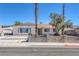 Single story home with landscaped front yard and driveway at 7220 Stormson Dr, Las Vegas, NV 89145
