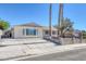 Single story home with landscaped yard and driveway at 7220 Stormson Dr, Las Vegas, NV 89145