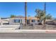 Charming single-story home with desert landscaping, a fenced yard, and ample driveway space at 7220 Stormson Dr, Las Vegas, NV 89145