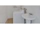 Laundry room with washer, dryer and pedestal sink at 7220 Stormson Dr, Las Vegas, NV 89145