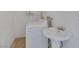 Functional laundry room with a washing machine and sink, ideal for household tasks at 7220 Stormson Dr, Las Vegas, NV 89145