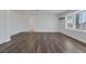 Bright living room with hardwood floors and natural light at 7220 Stormson Dr, Las Vegas, NV 89145