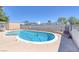 Inviting kidney-shaped pool, perfect for relaxation at 7220 Stormson Dr, Las Vegas, NV 89145