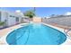 Inviting kidney-shaped pool, perfect for relaxation at 7220 Stormson Dr, Las Vegas, NV 89145