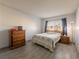 Bright bedroom with classic wooden furniture and a comfortable queen-sized bed at 725 N Royal Crest Cir # 215, Las Vegas, NV 89169