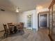 Dining room with wood table and floor-to-ceiling display cabinet at 725 N Royal Crest Cir # 215, Las Vegas, NV 89169