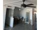 Cozy dining area with a ceiling fan and classic furniture creates a welcoming atmosphere at 725 N Royal Crest Cir # 215, Las Vegas, NV 89169