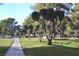 Well-maintained green space featuring walking paths and meticulously manicured trees at 725 N Royal Crest Cir # 215, Las Vegas, NV 89169