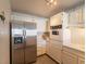 Kitchen featuring a stainless steel refrigerator and an oven at 725 N Royal Crest Cir # 215, Las Vegas, NV 89169