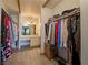 Well-organized walk-in closet featuring ample storage and a vanity area at 725 N Royal Crest Cir # 215, Las Vegas, NV 89169