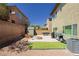 Backyard with patio, fire pit, and grill at 7611 Phoenix Peak St, Las Vegas, NV 89166
