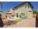Backyard with patio, fire pit, and built in BBQ at 7611 Phoenix Peak St, Las Vegas, NV 89166