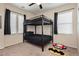 Bedroom with a bunk bed, ideal for children or guests at 7611 Phoenix Peak St, Las Vegas, NV 89166