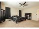 Second bedroom with a queen bed, and built-in shelving at 7611 Phoenix Peak St, Las Vegas, NV 89166