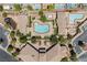 Aerial view of community pool, spa, and playground at 7611 Phoenix Peak St, Las Vegas, NV 89166