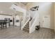 Two-story entryway with staircase and hardwood floors at 7611 Phoenix Peak St, Las Vegas, NV 89166