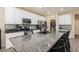 Kitchen with granite countertops and stainless steel appliances at 7611 Phoenix Peak St, Las Vegas, NV 89166