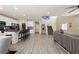 Bright living room with hardwood floors and open staircase at 7611 Phoenix Peak St, Las Vegas, NV 89166