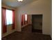 Bedroom with mirrored closet doors and brown carpet at 7815 Windward Rd, Las Vegas, NV 89147